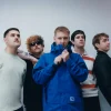 Militarie Gun announce their new album, 'God Save the Gun' (out Oct 17), and share the new single 'B A D I D E A.' Watch the video and get album details.
