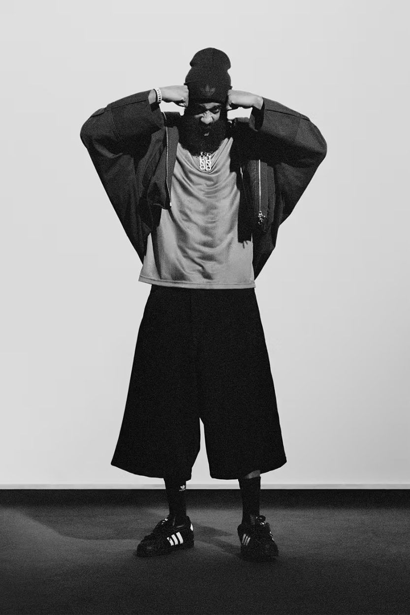 Samuel L Jackson walking through the endless corridors of a surreal hotel alongside Kendall Jenner wearing a red jacket and Tyshawn Jones wearing denim shorts.