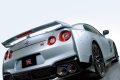 Nissan GT-R R36 concept render showing the next generation hybrid supercar on a race track.
