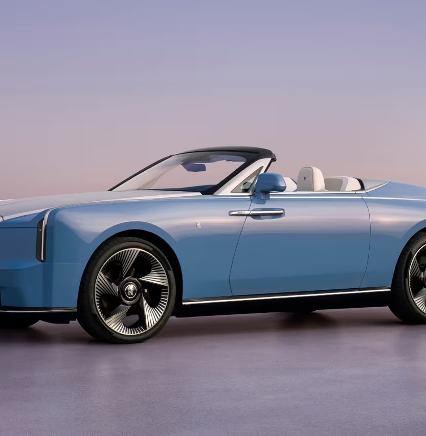 Rolls-Royce Project Nightingale fully electric open-top two-seater finished in Côte d'Azur Blue with 24-inch directional wheels.