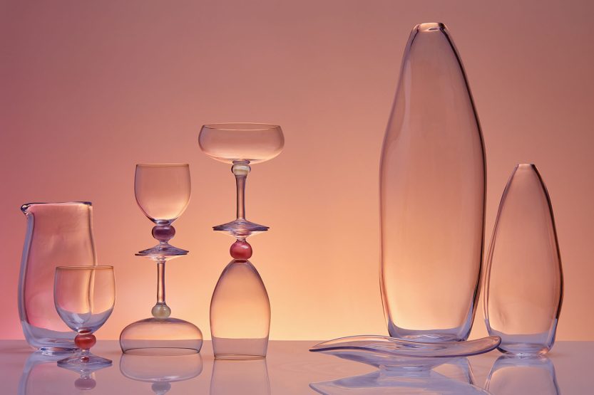 Hand-blown glass vessels and pendulous lamps from Helle Mardahl's new collection for Design Within Reach in shades of rhubarb, plum, and creamy melon.